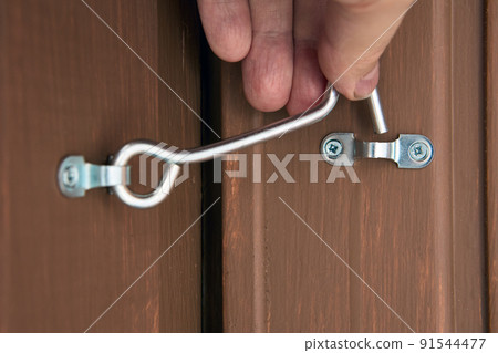 Security hook and eye door lock for doors locking of country house. 91544477