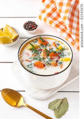 Lohikeitto, Finnish creamy salmon soup in a white bowl Lohikeitto, Finnish creamy salmon soup in a white bowl 91545070