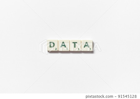 Data formed of scrabble tiles on white background. 91545128