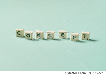 Concept formed of scrabble elements on turquoise background. Concept formed of scrabble elements on turquoise background. 91545224