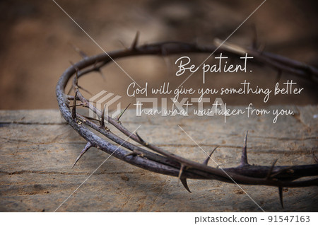 Christian prayer quote - Be patient. God will give you something better that what was taken from you. With crown thorns and old wooden block background. Christianity concept Christian prayer quote - Be patient. God will give you something better that what was taken from you. With crown thorns and old wooden block background. Christianity concept 91547163