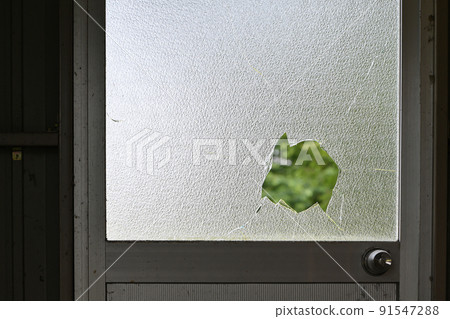 Broken window glass 91547288