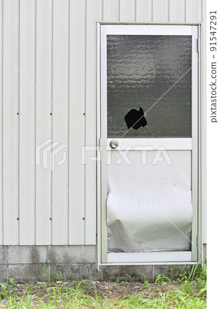 Broken window glass 91547291