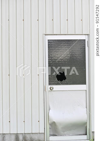 Broken window glass 91547292