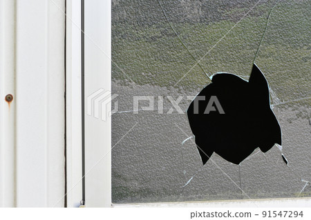 Broken window glass 91547294