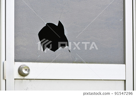 Broken window glass 91547296