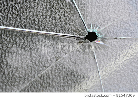 Broken window glass 91547309