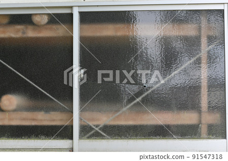 Broken window glass Broken window glass 91547318