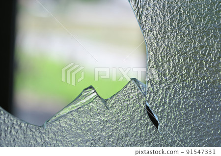 Broken window glass Broken window glass 91547331