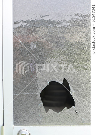 Broken window glass 91547341