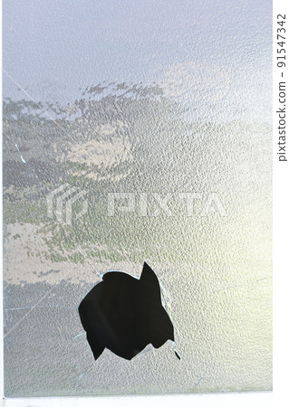 Broken window glass 91547342