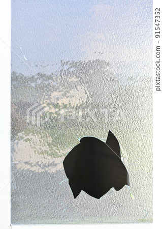Broken window glass 91547352