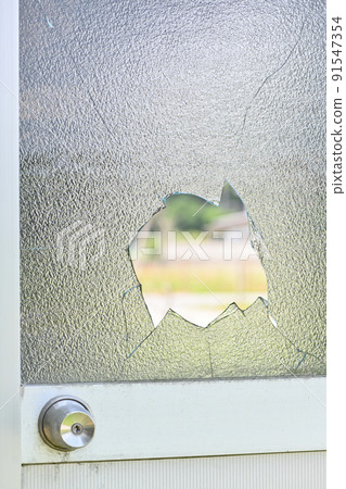 Broken window glass 91547354