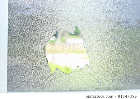 Broken window glass Broken window glass 91547359