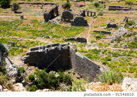 Ruins of ancient city Sillyon. Ancient ruins with roman baths Ruins of ancient city Sillyon. Ancient ruins with roman baths 91548810