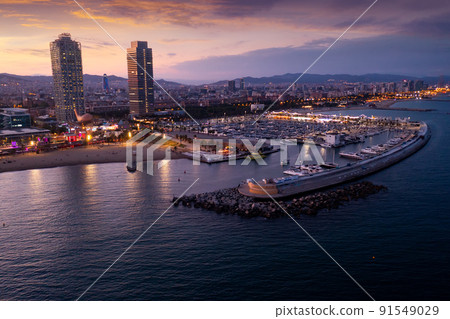 Evening aerial view of coastal area of Barcelona in summer, Spain Evening aerial view of coastal area of Barcelona in summer, Spain 91549029