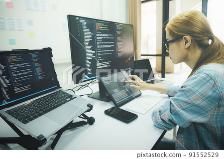 Programmer is coding and programming software. 91552529
