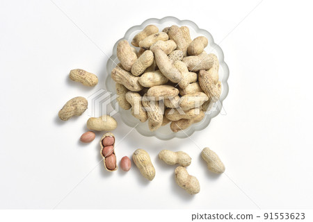Pile of dry deli peanut snacks 91553623