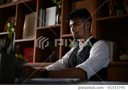 Professional smart asian businessman using laptop computer, working at his desk 91553745