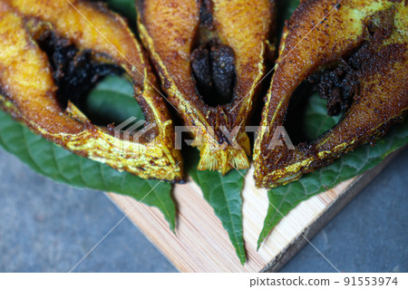 fried Hilsa fish on kitchen 91553974