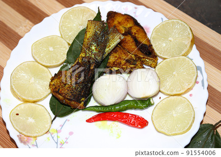 fried Hilsa fish on kitchen 91554006