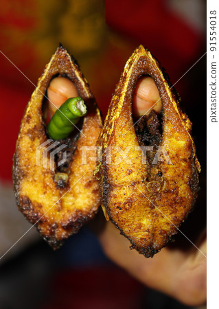 fried Hilsa fish on kitchen 91554018