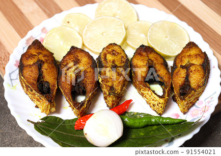 fried Hilsa fish on kitchen fried Hilsa fish on kitchen 91554021