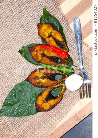 fried Hilsa fish on kitchen 91554027
