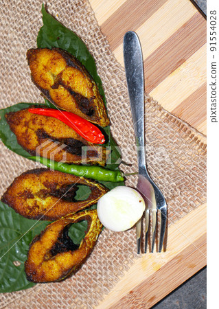 fried Hilsa fish on kitchen fried Hilsa fish on kitchen 91554028