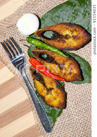 fried Hilsa fish on kitchen fried Hilsa fish on kitchen 91554035
