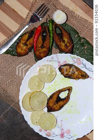 fried Hilsa fish on kitchen fried Hilsa fish on kitchen 91554036
