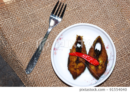 fried Hilsa fish on kitchen fried Hilsa fish on kitchen 91554040
