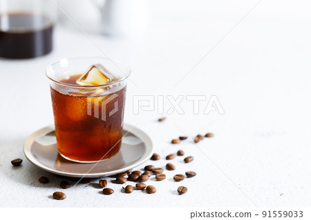 Iced Coffee on white marble table. Iced Coffee on white marble table. 91559033