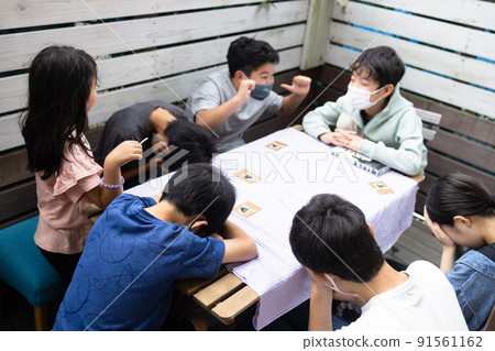 Children playing card games Children playing card games 91561162