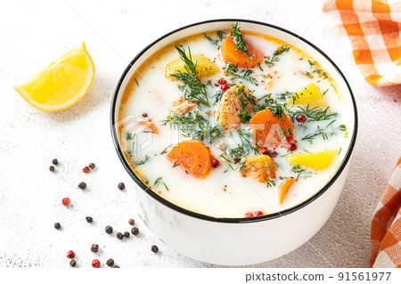 Lohikeitto, Finnish creamy salmon soup in a white bowl Lohikeitto, Finnish creamy salmon soup in a white bowl 91561977