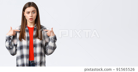 Lifestyle, different emotions, leisure activities concept. Confused young girl cant understand why she. Puzzled woman pointing at herself with raised eyebrow, being chosen, white background Lifestyle, different emotions, leisure activities concept. Confused young girl cant understand why she. Puzzled woman pointing at herself with raised eyebrow, being chosen, white background 91565526
