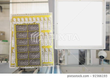 Process of creating a printed circuit board. printed circuit board in production. Just made batch of Process of creating a printed circuit board. printed circuit board in production. Just made batch of 91566193