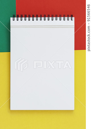 Open spiral notepad on bright background. Flat lay with copy space 91566546