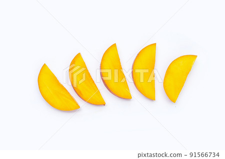 Mango fruit slices on white background. Mango fruit slices on white background. 91566734