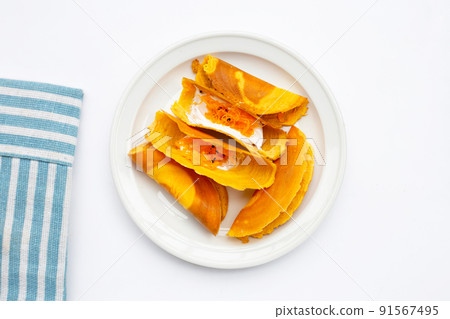 Thai crispy pancakes on white background. 91567495