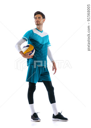 Portrait of young man, volleyball player posing in uniform isolated over white studio background Portrait of young man, volleyball player posing in uniform isolated over white studio background 91568005