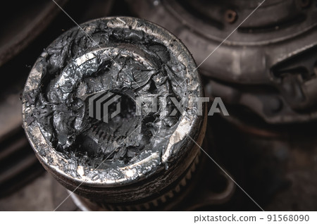 Old used dirty CV joints close-up among used automotive scrap metal CV joints replacement, car repair 91568090