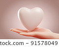Hand holding white heart over pink background. Concept of love, valentine and support. 3D rendering. 91578049