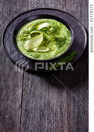 Tarator, summer cold cucumber soup in bowl 91578573