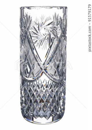 Crystal Empty glass Faceted Transparent Vase with carving pattern isolated on white background. Vintage item Use for flowers and interior decoration. Crystal Empty glass Faceted Transparent Vase with carving pattern isolated on white background. Vintage item Use for flowers and interior decoration. 91579179