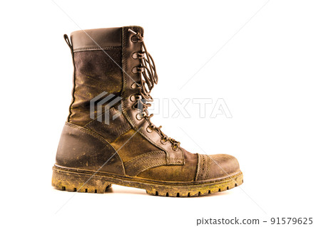 dirty military style light ankle boot isolated on white background 91579625