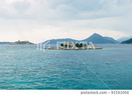 Castle on the island of Otocic Gospa in the Bay of Kotor. Montenegro Castle on the island of Otocic Gospa in the Bay of Kotor. Montenegro 91581008