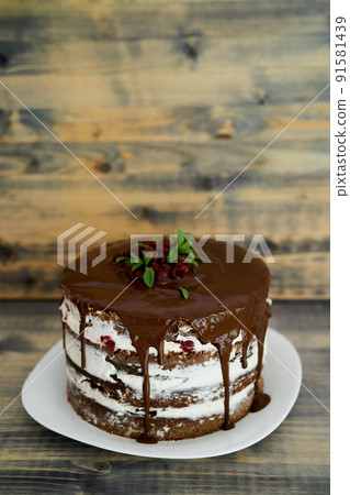 Chocolate brownie cake on a wooden table 91581439