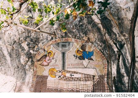 Mosaic with the image of St. Basil and the angels above him in the Ostrog monastery. Montenegro 91582404