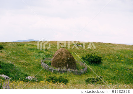 Fenced haystack in Durmitor National Park. Montenegro Fenced haystack in Durmitor National Park. Montenegro 91582838